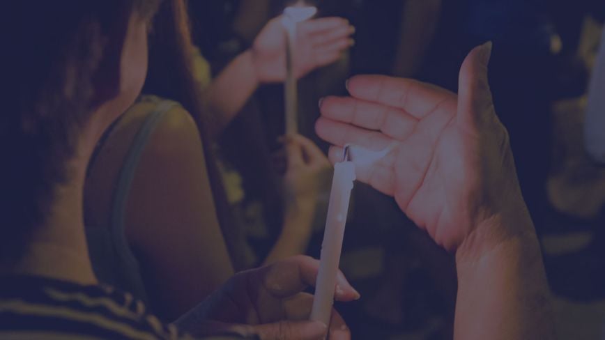 People at a candlelit vigil