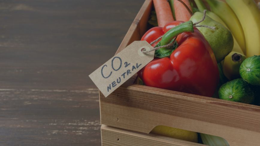 A wooden crate full of fresh produce